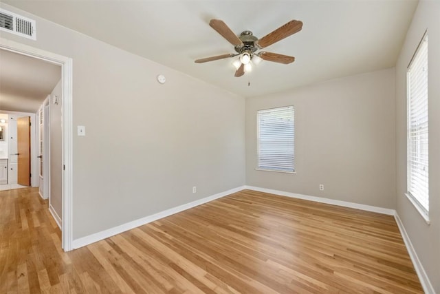 1410 Yorkshire Dr, Austin, TX 78723 - unfurnished room with light wood-style flooring and ceiling fan