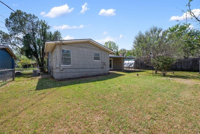 1410 Yorkshire Dr, Austin, TX 78723 - rear view of property with a fenced backyard