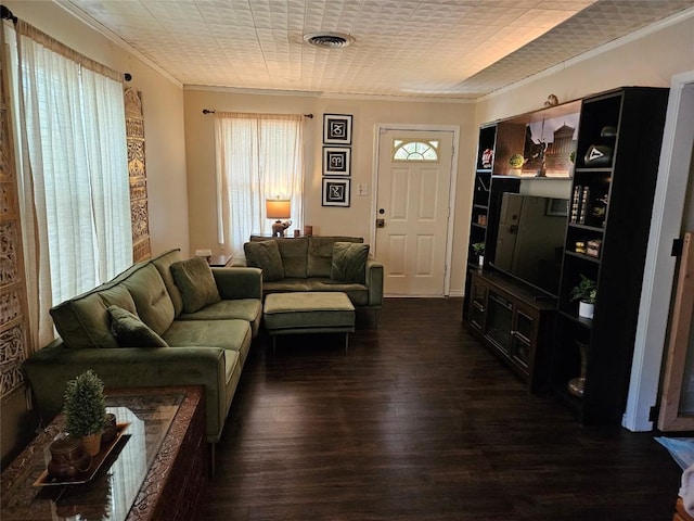 living room featuring crown molding, visible vents, and dark wood-style floors