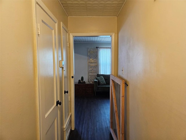 corridor with dark wood finished floors