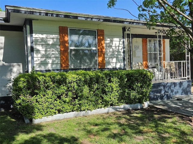 view of home's exterior featuring a porch