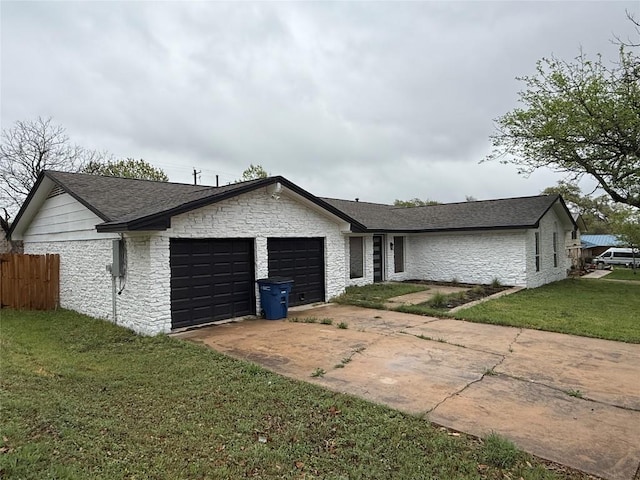 1402 Cardinal Hill Dr, Austin, TX 78758 - view of front facade with a garage, stone siding, concrete driveway, and roof with shingles