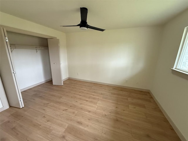 1402 Cardinal Hill Dr, Austin, TX 78758 - unfurnished bedroom with light wood-style flooring, a closet, baseboards, and a ceiling fan
