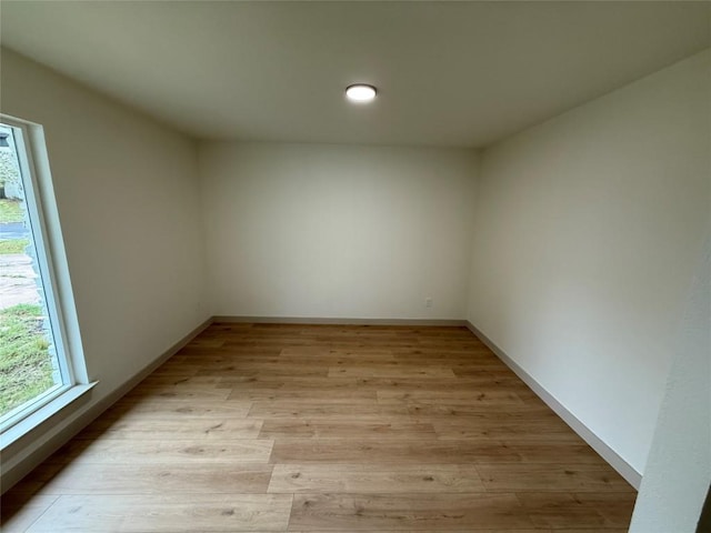 1402 Cardinal Hill Dr, Austin, TX 78758 - unfurnished room featuring light wood-style floors and baseboards