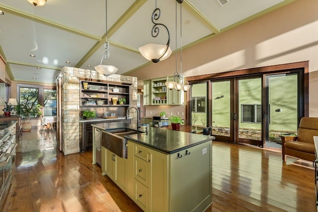 8700 Crest View Rd, Austin, TX 78737 - kitchen featuring open shelves, dark countertops, cream cabinets, dark wood-type flooring, and vaulted ceiling