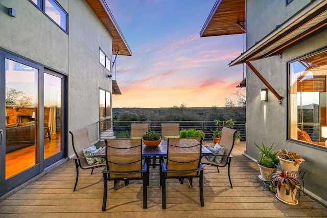 8700 Crest View Rd, Austin, TX 78737 - deck at dusk with outdoor dining area