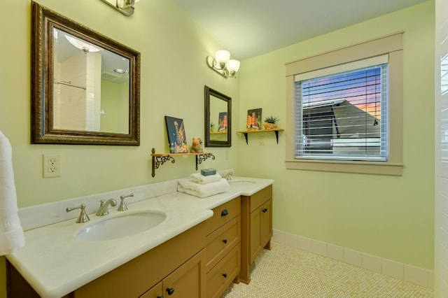 8700 Crest View Rd, Austin, TX 78737 - bathroom featuring double vanity and baseboards