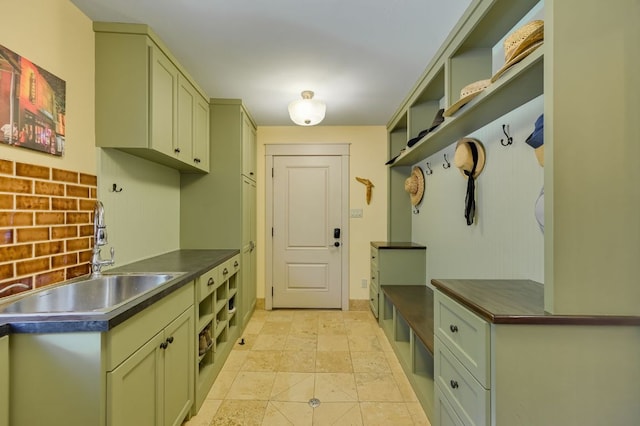 8700 Crest View Rd, Austin, TX 78737 - mudroom with a sink and baseboards