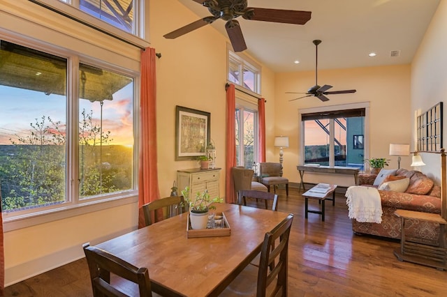 8700 Crest View Rd, Austin, TX 78737 - dining room featuring a ceiling fan, healthy amount of natural light, wood finished floors, recessed lighting, and a high ceiling