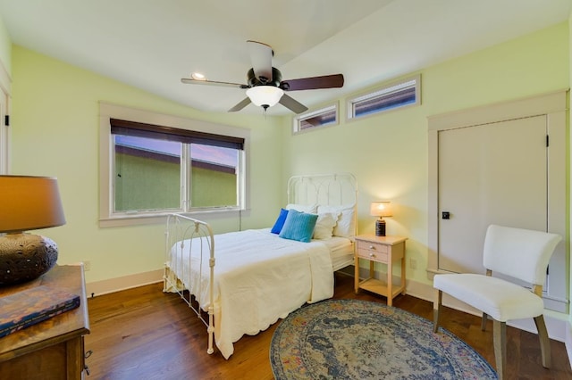 8700 Crest View Rd, Austin, TX 78737 - bedroom featuring dark wood-style flooring and a ceiling fan