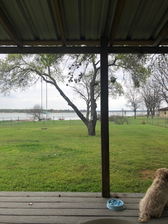 658 Golden Beach Dr, Buchanan Dam, TX 78609 - view of yard featuring a water view and fence