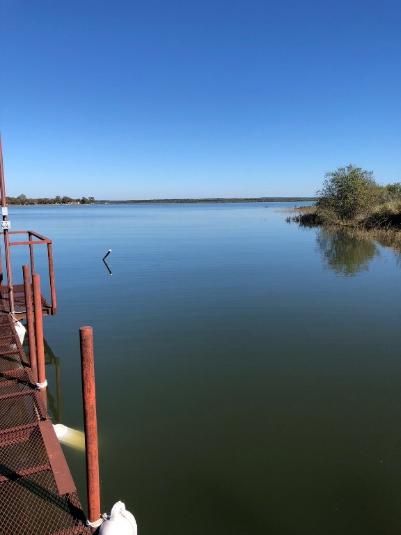 658 Golden Beach Dr, Buchanan Dam, TX 78609 - water view featuring a dock