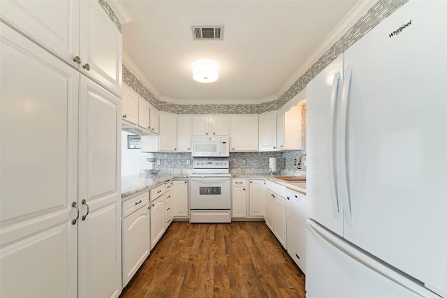 658 Golden Beach Dr, Buchanan Dam, TX 78609 - kitchen featuring white cabinetry, tasteful backsplash, white appliances, a sink, and visible vents