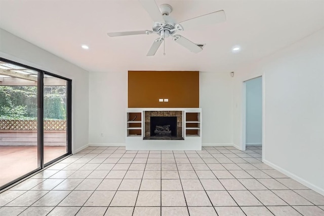 3108 Matador Dr, Austin, TX 78741 - unfurnished living room with a ceiling fan, baseboards, recessed lighting, and a fireplace