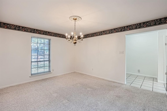 3108 Matador Dr, Austin, TX 78741 - spare room with an inviting chandelier, baseboards, light tile patterned floors, and light carpet