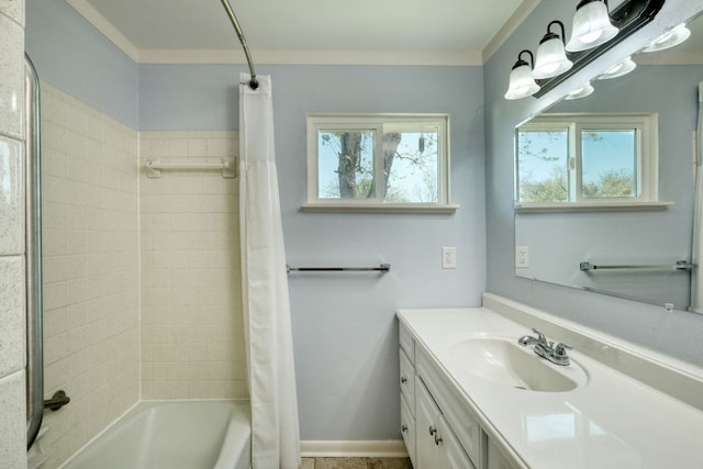 818 Kimbro St, Taylor, TX 76574 - bathroom featuring plenty of natural light, vanity, shower / bath combination with curtain, and crown molding