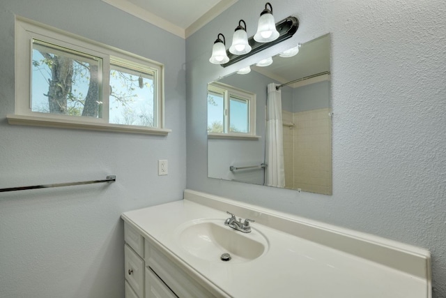 818 Kimbro St, Taylor, TX 76574 - bathroom with vanity and a shower with curtain