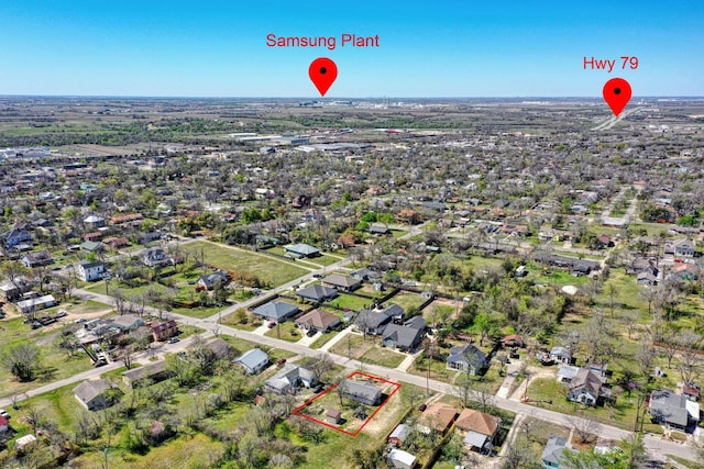 818 Kimbro St, Taylor, TX 76574 - aerial overview of property's location with property parcel outlined