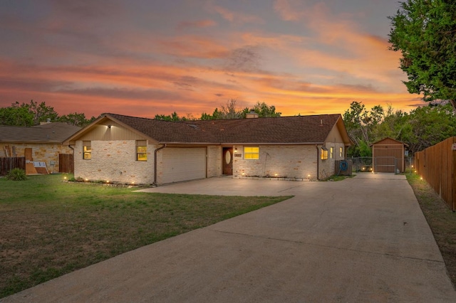 20807 Boggy Ford Rd, Lago Vista, TX 78645 - view of front facade with driveway, a garage, brick siding, a chimney, and a gate
