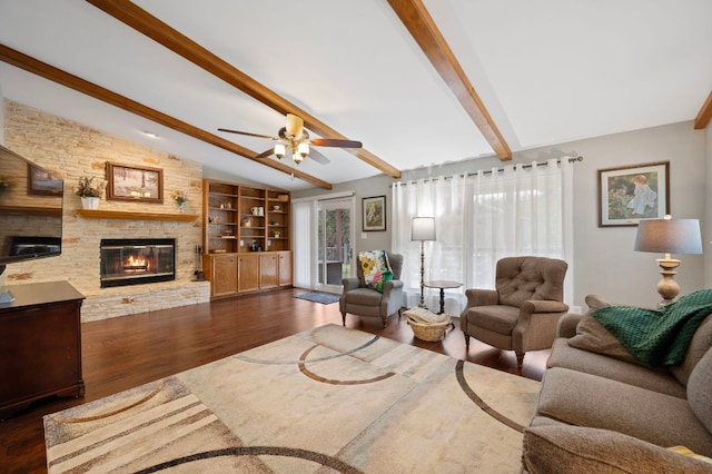 20807 Boggy Ford Rd, Lago Vista, TX 78645 - living area featuring a large fireplace, dark wood finished floors, and a ceiling fan
