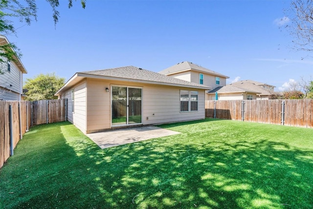 132 Grazing Horse Ln, Manchaca, TX 78652 - rear view of house featuring a fenced backyard, a patio area, and a yard