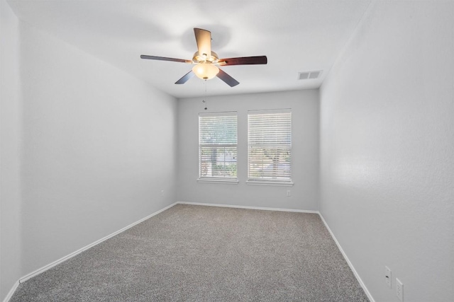 132 Grazing Horse Ln, Manchaca, TX 78652 - spare room featuring baseboards, visible vents, ceiling fan, and carpet flooring