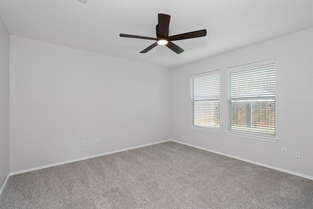 132 Grazing Horse Ln, Manchaca, TX 78652 - unfurnished room featuring baseboards, ceiling fan, and carpet flooring