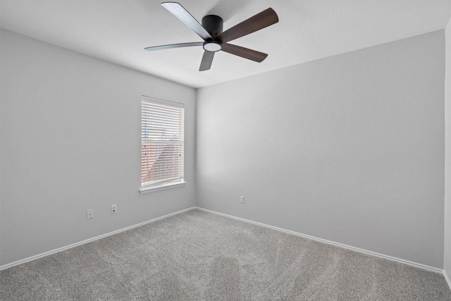 132 Grazing Horse Ln, Manchaca, TX 78652 - spare room with baseboards, carpet floors, and ceiling fan