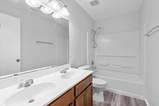 132 Grazing Horse Ln, Manchaca, TX 78652 - full bath featuring visible vents, toilet, and a sink