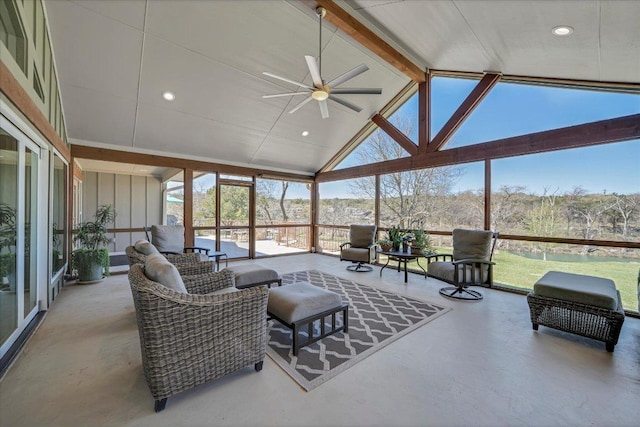 sunroom featuring ceiling fan and an outdoor hangout area
