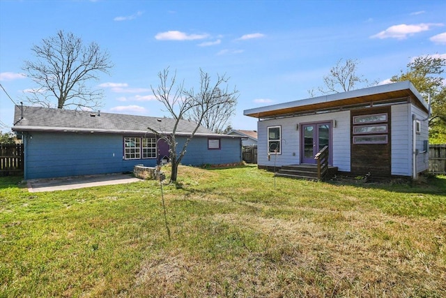 100 E Lisa Dr, Austin, TX 78752 - rear view of house featuring a patio area