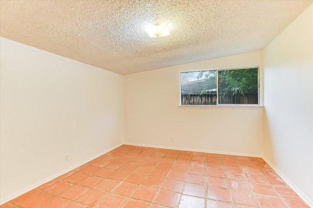 100 E Lisa Dr, Austin, TX 78752 - unfurnished room with a textured ceiling and light tile patterned floors