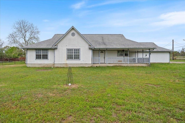182 Lake Front Dr, Cedar Creek, TX 78612 - rear view of property featuring a lawn, a porch, and a ceiling fan