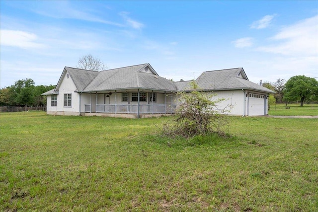 182 Lake Front Dr, Cedar Creek, TX 78612 - view of front of house with a garage, covered porch, and a front yard