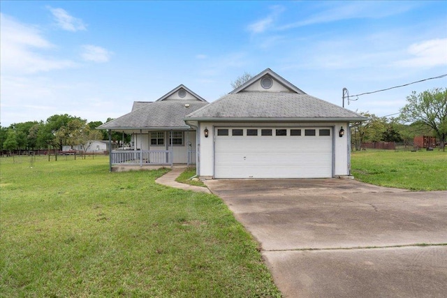 182 Lake Front Dr, Cedar Creek, TX 78612 - single story home featuring covered porch, a front yard, driveway, and roof with shingles
