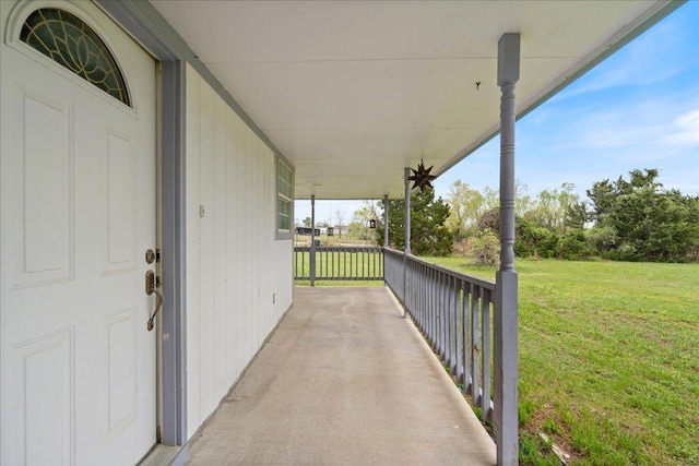 182 Lake Front Dr, Cedar Creek, TX 78612 - porch featuring a yard