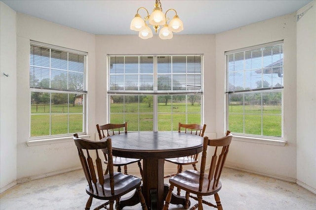 182 Lake Front Dr, Cedar Creek, TX 78612 - dining area with a chandelier and healthy amount of natural light