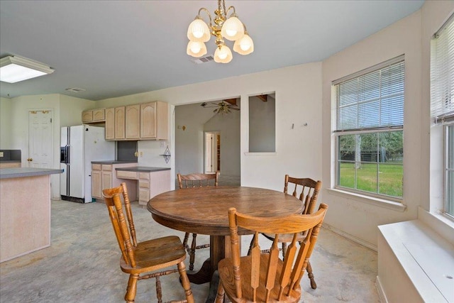 182 Lake Front Dr, Cedar Creek, TX 78612 - dining room featuring a chandelier and ceiling fan