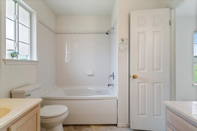 182 Lake Front Dr, Cedar Creek, TX 78612 - bathroom featuring vanity, healthy amount of natural light, and bathtub / shower combination