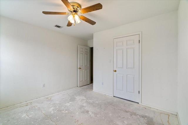 182 Lake Front Dr, Cedar Creek, TX 78612 - unfurnished bedroom featuring unfinished concrete floors and ceiling fan