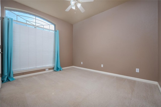 455 Rose Blossom Loop, La Vernia, TX 78121 - unfurnished room with carpet, a ceiling fan, and vaulted ceiling