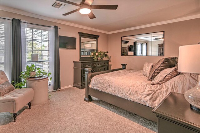 2921 Olympia Dr, Temple, TX 76502 - carpeted bedroom featuring ceiling fan, visible vents, and crown molding