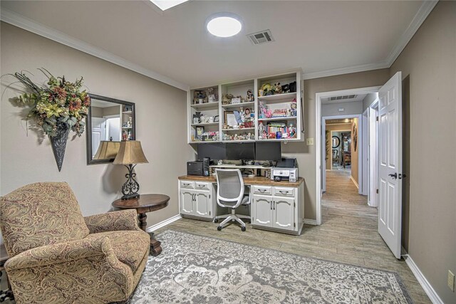 2921 Olympia Dr, Temple, TX 76502 - office space featuring baseboards, visible vents, light wood-type flooring, and ornamental molding