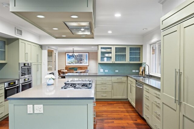 3608 Edgemont Dr, Austin, TX 78731 - kitchen with stainless steel appliances, dark wood-type flooring, glass insert cabinets, and recessed lighting
