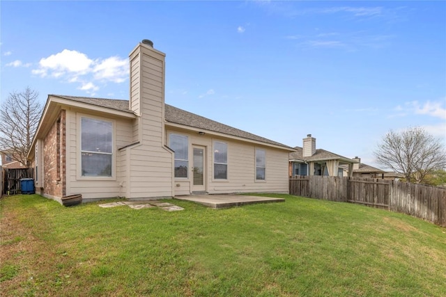 1628 Hidden Springs Path, Round Rock, TX 78665 - back of property with a chimney and a patio