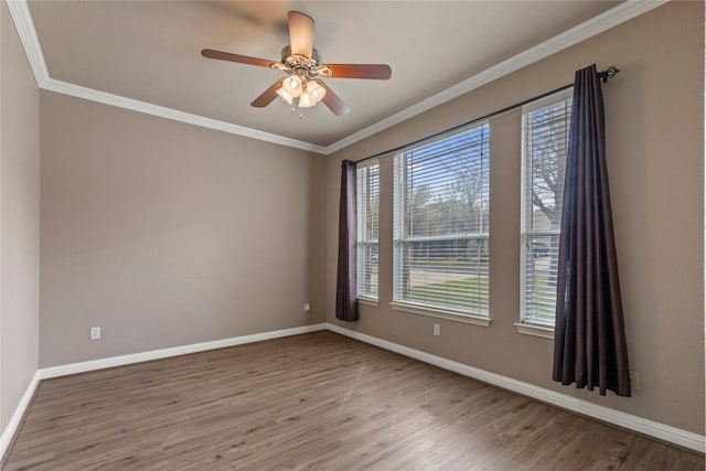 1628 Hidden Springs Path, Round Rock, TX 78665 - spare room with wood finished floors, baseboards, crown molding, and a ceiling fan