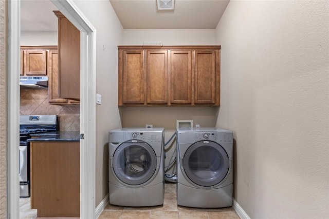 1628 Hidden Springs Path, Round Rock, TX 78665 - washroom with washer and dryer, cabinet space, and baseboards