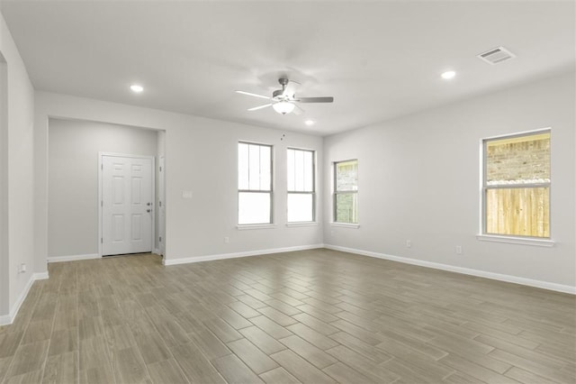 18309 Emu Ln, Manor, TX 78653 - empty room featuring a ceiling fan, recessed lighting, baseboards, and wood finished floors