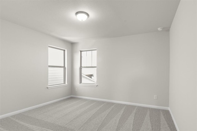 18309 Emu Ln, Manor, TX 78653 - carpeted empty room featuring baseboards and a smoke detector