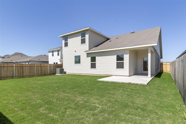 18309 Emu Ln, Manor, TX 78653 - back of house featuring cooling unit, a patio, and roof with shingles